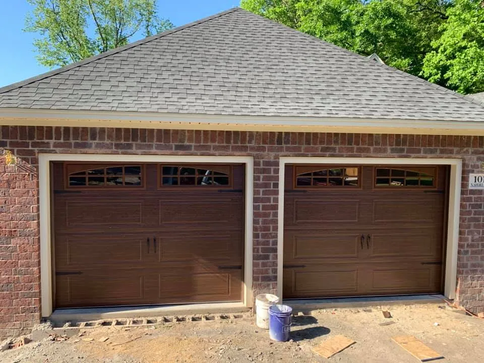 Pair of brown raised-panel garage doors